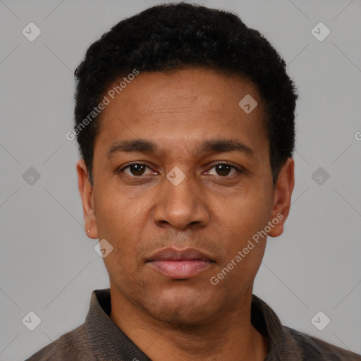 Neutral latino adult male with short  black hair and brown eyes