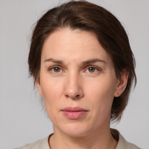 Neutral white adult female with medium  brown hair and brown eyes