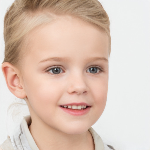 Joyful white child female with short  blond hair and blue eyes