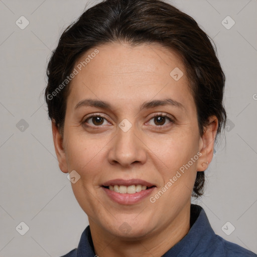 Joyful white adult female with short  brown hair and brown eyes