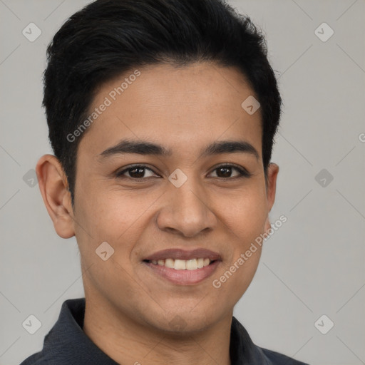 Joyful latino young-adult male with short  black hair and brown eyes