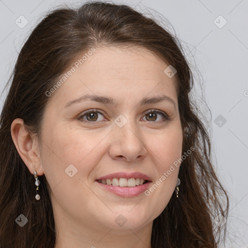 Joyful white young-adult female with long  brown hair and brown eyes