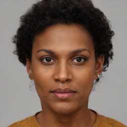 Neutral black young-adult female with short  brown hair and brown eyes