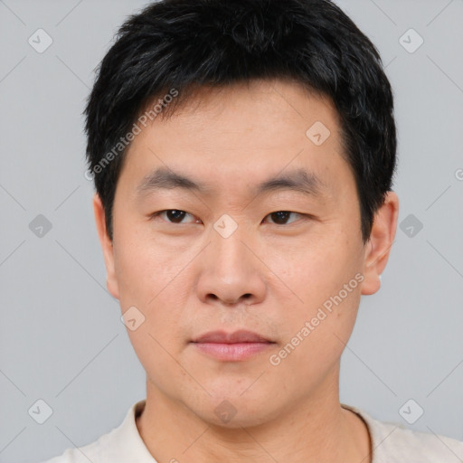 Neutral asian young-adult male with short  black hair and brown eyes