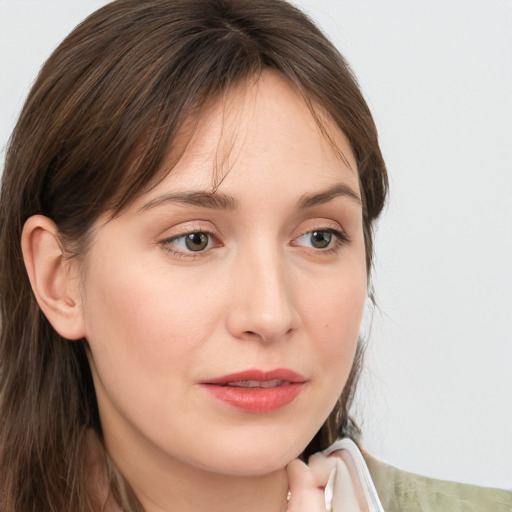 Neutral white young-adult female with medium  brown hair and grey eyes