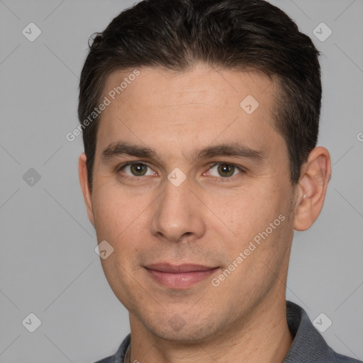 Joyful white young-adult male with short  brown hair and brown eyes