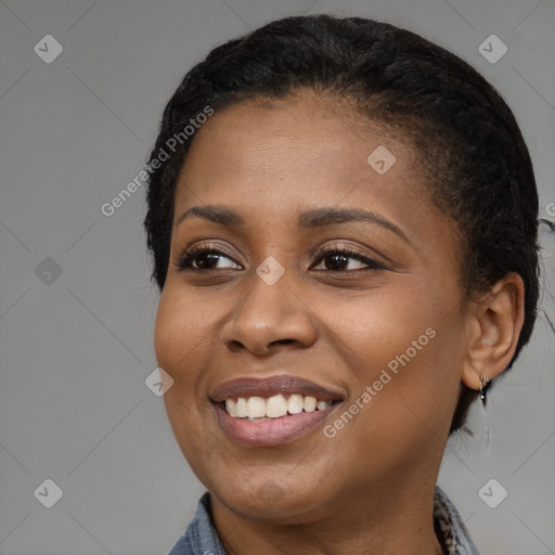 Joyful black young-adult female with medium  black hair and brown eyes