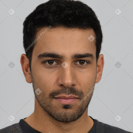 Neutral latino young-adult male with short  black hair and brown eyes