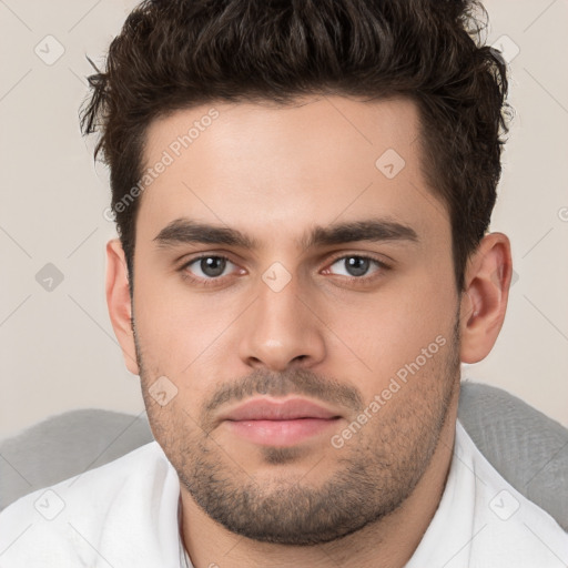 Neutral white young-adult male with short  brown hair and brown eyes