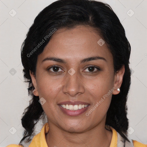 Joyful latino young-adult female with medium  brown hair and brown eyes