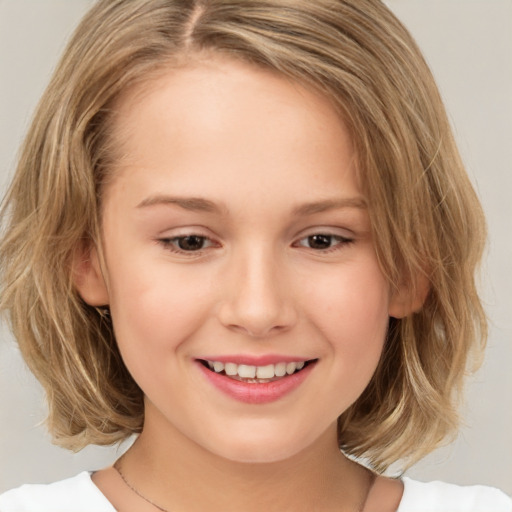 Joyful white child female with medium  brown hair and brown eyes