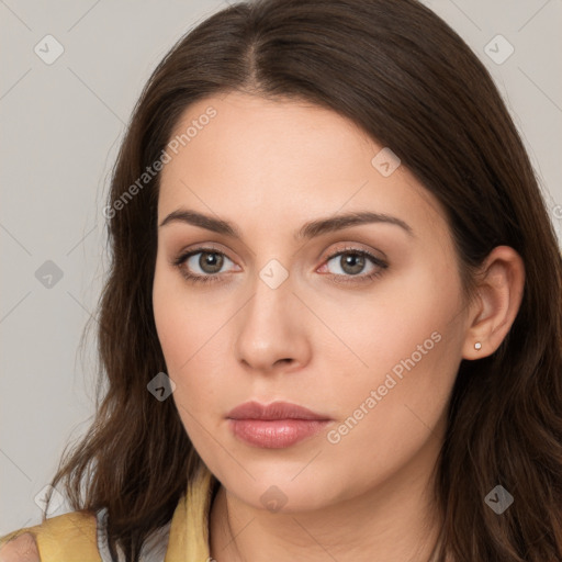 Neutral white young-adult female with long  brown hair and brown eyes