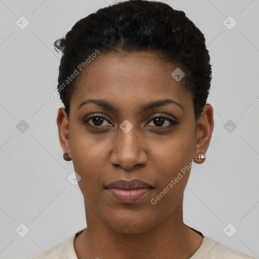 Joyful black young-adult female with short  black hair and brown eyes