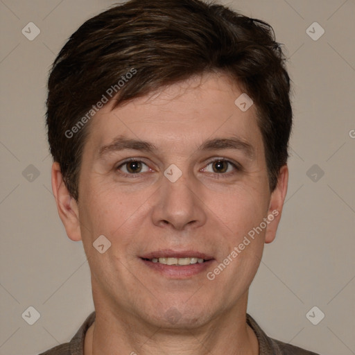 Joyful white adult male with short  brown hair and brown eyes