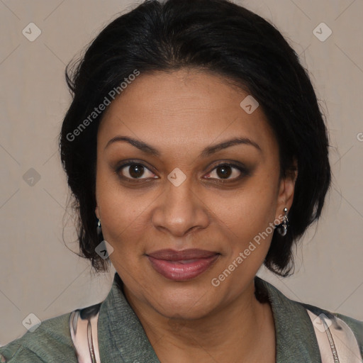 Joyful black adult female with medium  brown hair and brown eyes