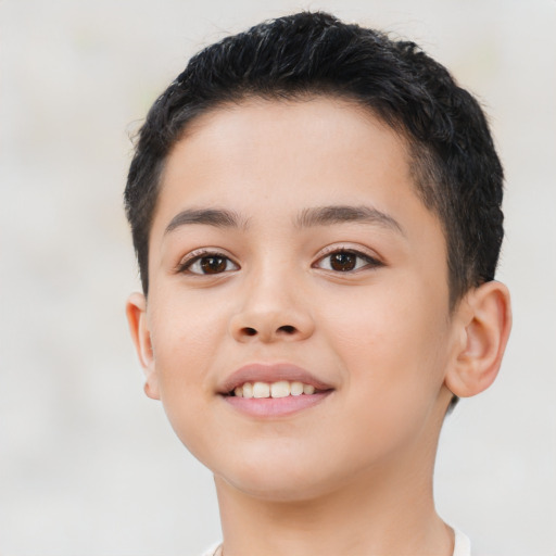 Joyful latino child female with short  brown hair and brown eyes