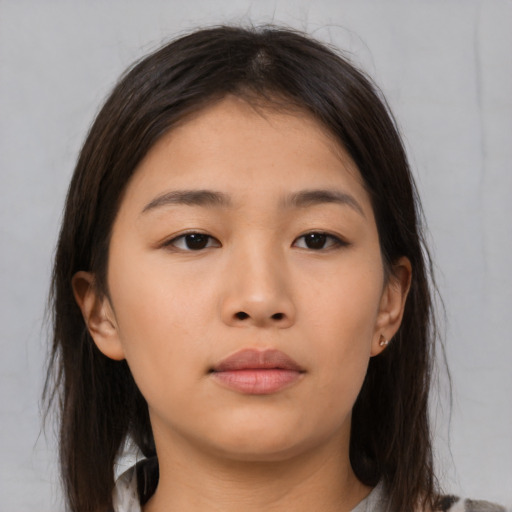 Neutral asian young-adult female with medium  brown hair and brown eyes