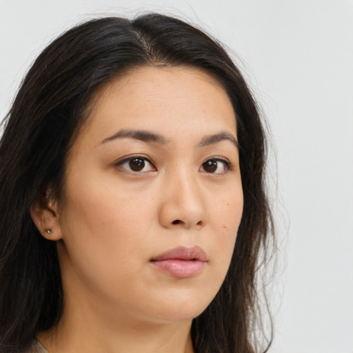 Neutral white young-adult female with long  brown hair and brown eyes