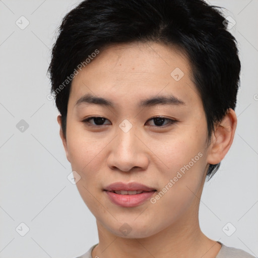 Joyful asian young-adult female with short  black hair and brown eyes