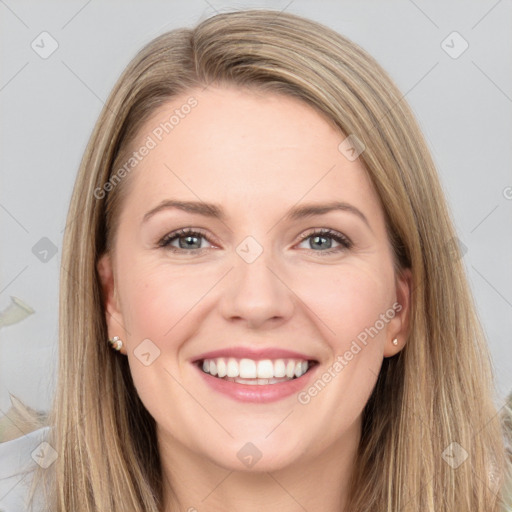 Joyful white young-adult female with long  brown hair and grey eyes