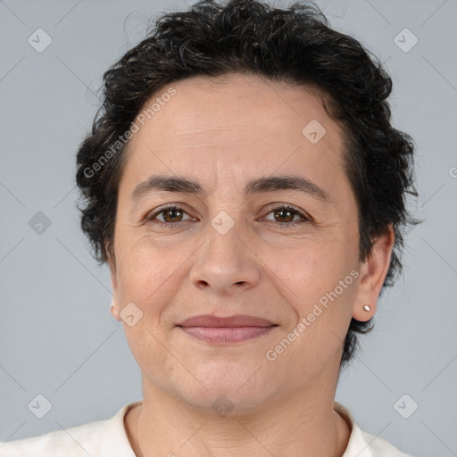 Joyful white adult female with short  brown hair and brown eyes