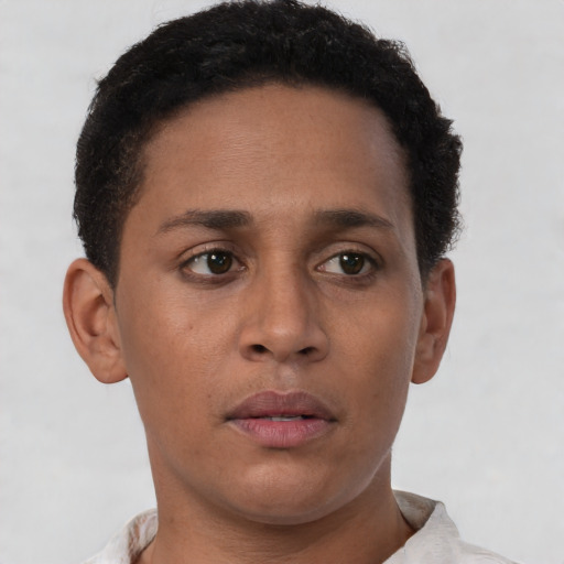 Neutral black young-adult female with short  brown hair and brown eyes
