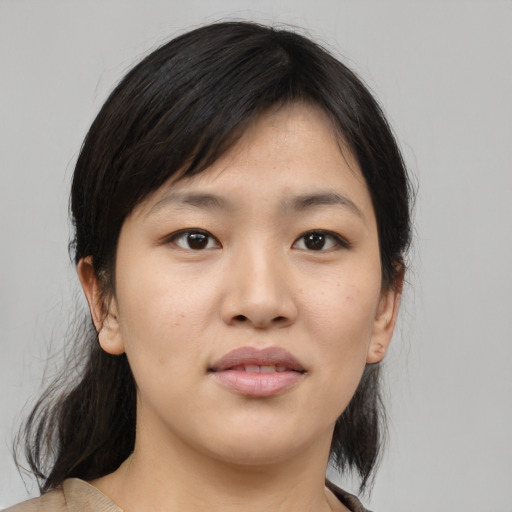 Neutral asian young-adult female with medium  brown hair and brown eyes