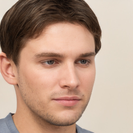 Neutral white young-adult male with short  brown hair and grey eyes