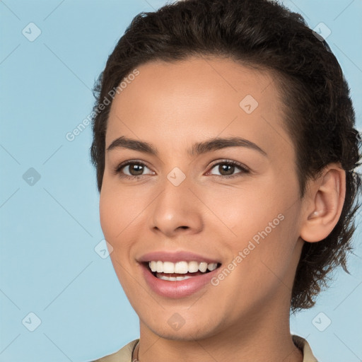 Joyful white young-adult female with short  brown hair and brown eyes