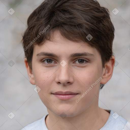 Joyful white child male with short  brown hair and brown eyes