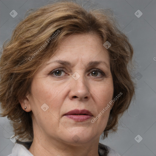 Joyful white adult female with medium  brown hair and grey eyes