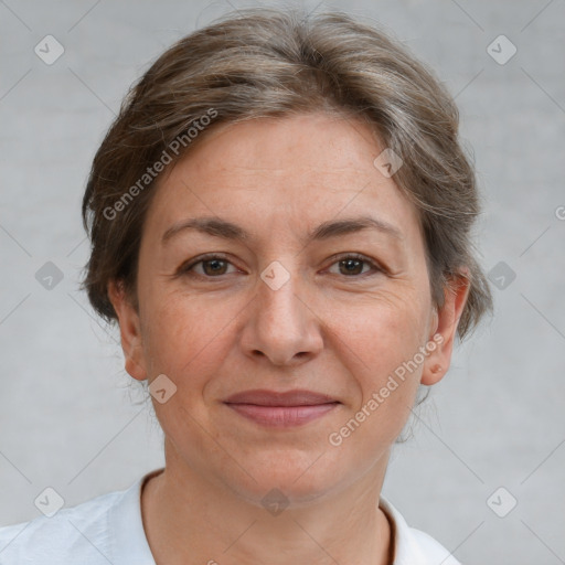 Joyful white adult female with short  brown hair and brown eyes