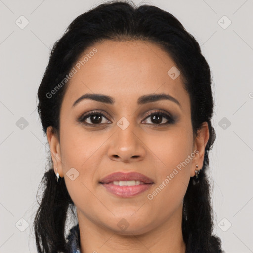 Joyful latino young-adult female with long  brown hair and brown eyes