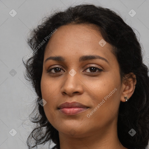 Joyful latino young-adult female with long  black hair and brown eyes