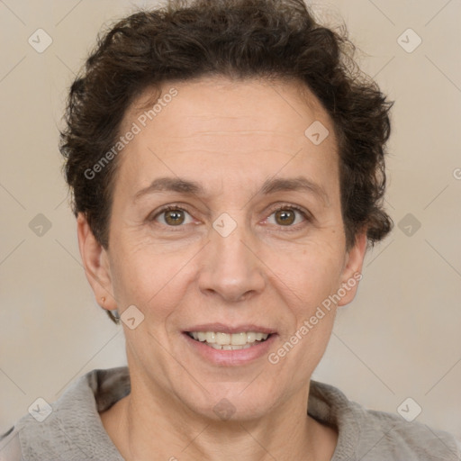 Joyful white adult female with short  brown hair and brown eyes