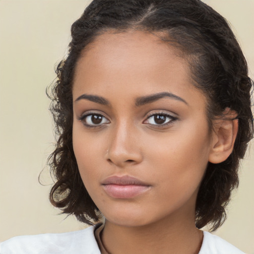 Neutral white young-adult female with medium  brown hair and brown eyes