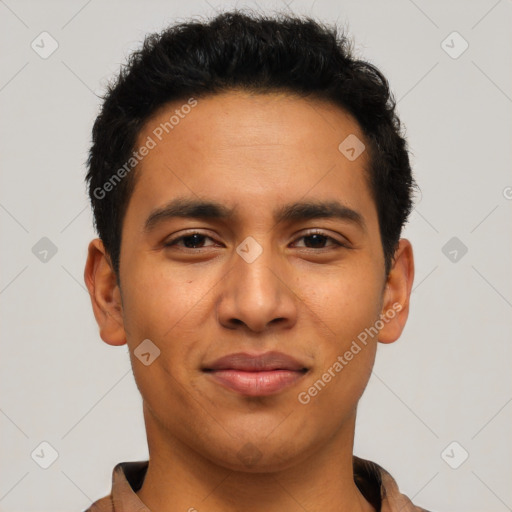 Joyful latino young-adult male with short  black hair and brown eyes