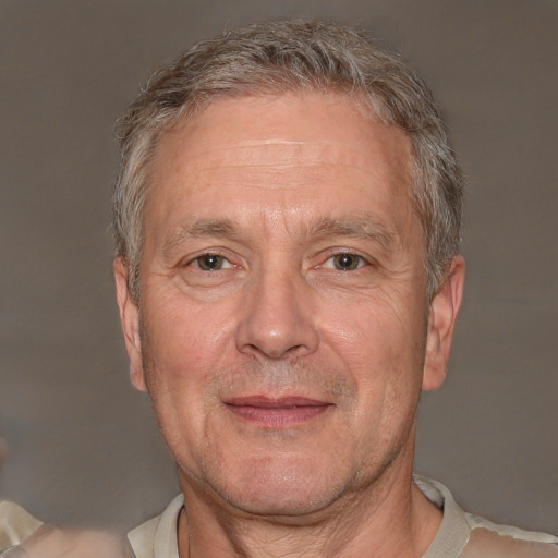 Neutral white middle-aged male with short  gray hair and brown eyes