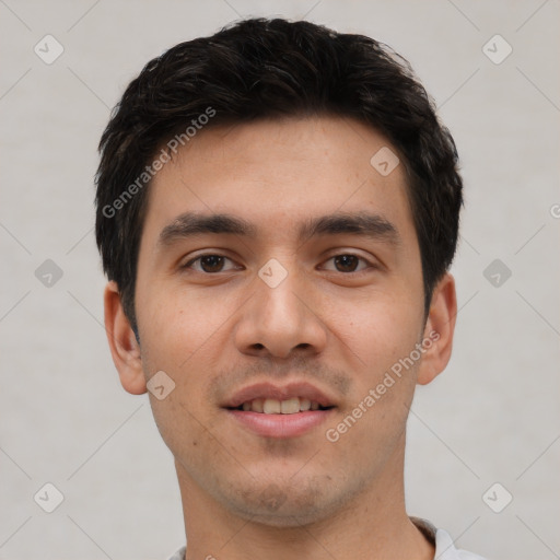 Joyful white young-adult male with short  black hair and brown eyes