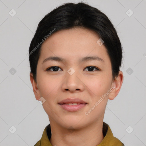 Joyful asian young-adult female with short  black hair and brown eyes