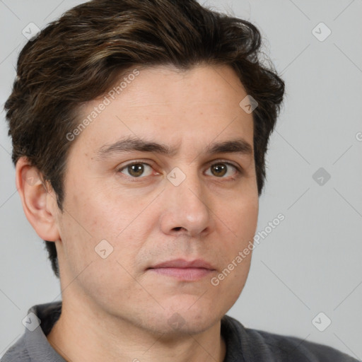 Neutral white adult male with short  brown hair and brown eyes