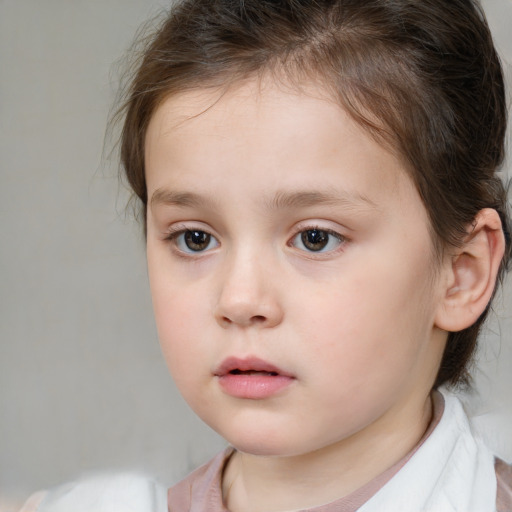 Neutral white child female with medium  brown hair and brown eyes