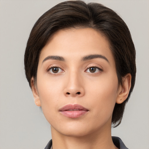 Neutral asian young-adult female with short  brown hair and brown eyes