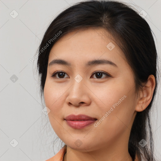 Joyful asian young-adult female with long  brown hair and brown eyes