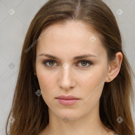 Neutral white young-adult female with long  brown hair and brown eyes