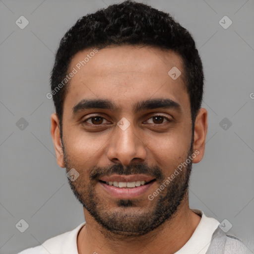 Joyful latino young-adult male with short  black hair and brown eyes