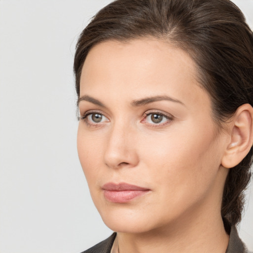 Neutral white young-adult female with medium  brown hair and brown eyes