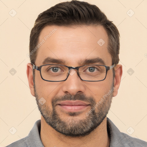 Joyful white adult male with short  brown hair and brown eyes