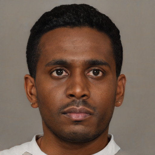 Neutral black young-adult male with short  black hair and brown eyes