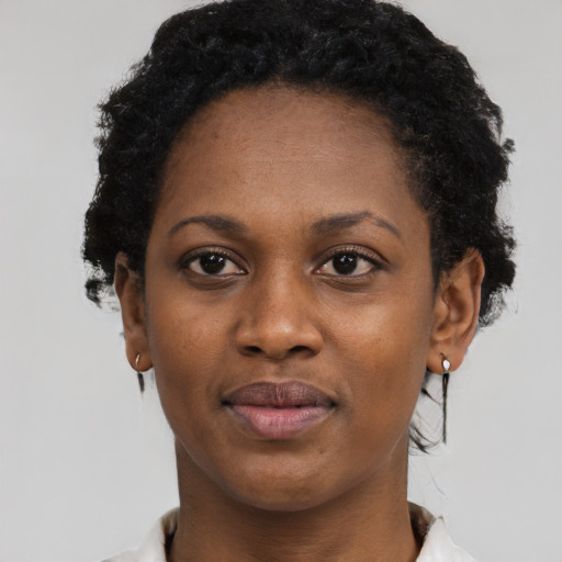 Neutral black young-adult female with short  black hair and brown eyes
